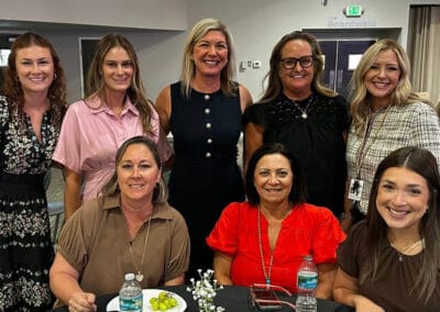 Large Group Members At Table 2025